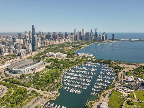 Lakeshore East and the New East Side with the cityscape of Chicago, including buildings like The St. Regis Chicago, shown from the southeast looking northeast, while Soldier Field is in view.