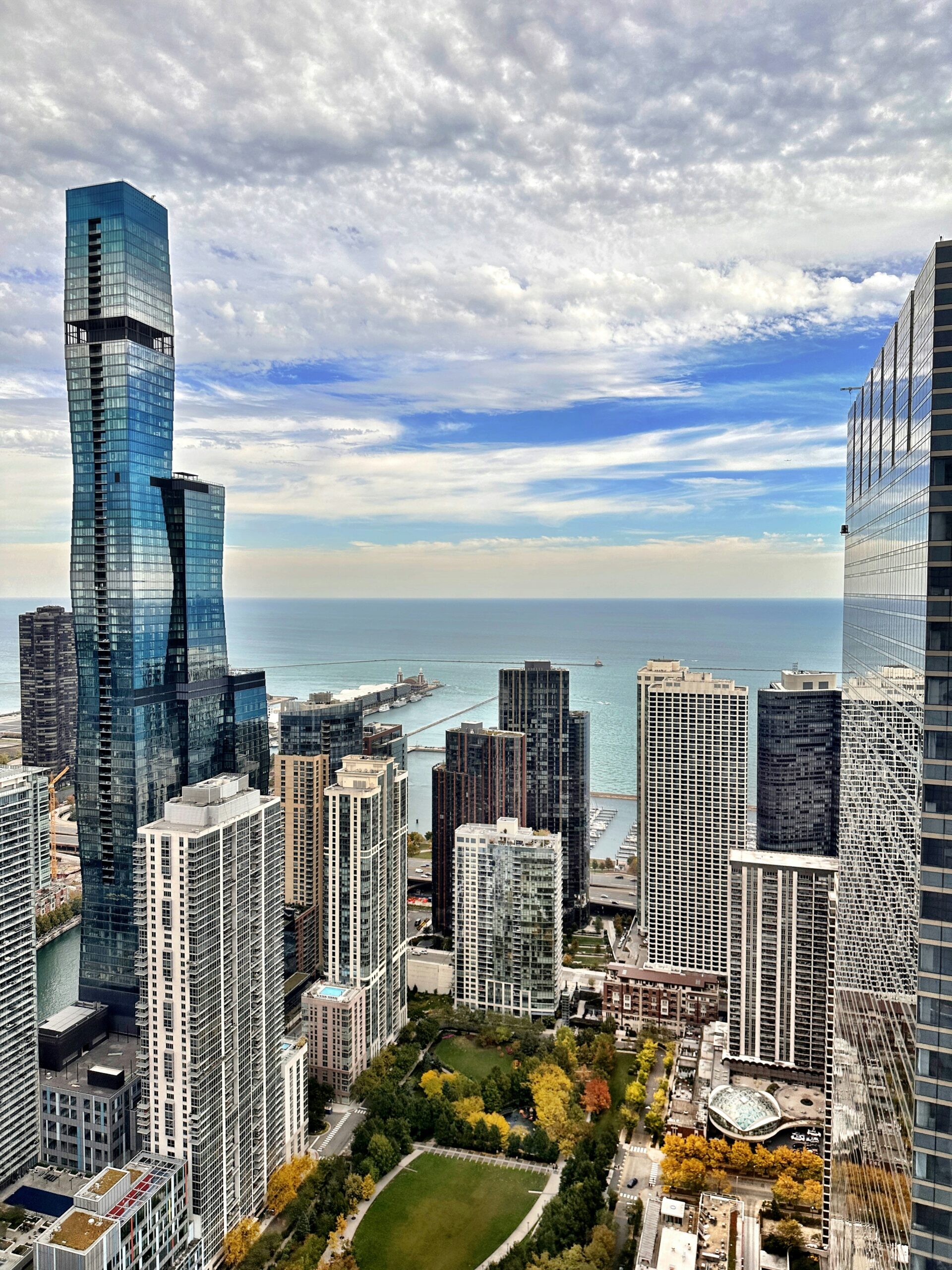 From hundreds of feet in the air, looking east to the Lakeshore East planned development of the New East Side which showcases the St. Regis Residences building and Lake Michigan in the background
