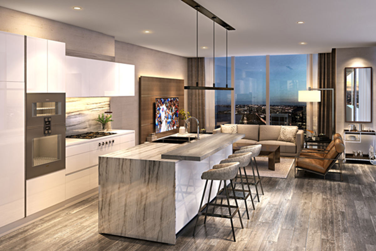Modern kitchen with island seating in one of St. Regis Chicago's luxury three bedroom condos